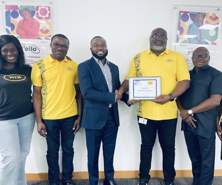 Mr William Tetteh (2nd r) leads the MTN Team to receive the Global Executive Council Certificate from PMI